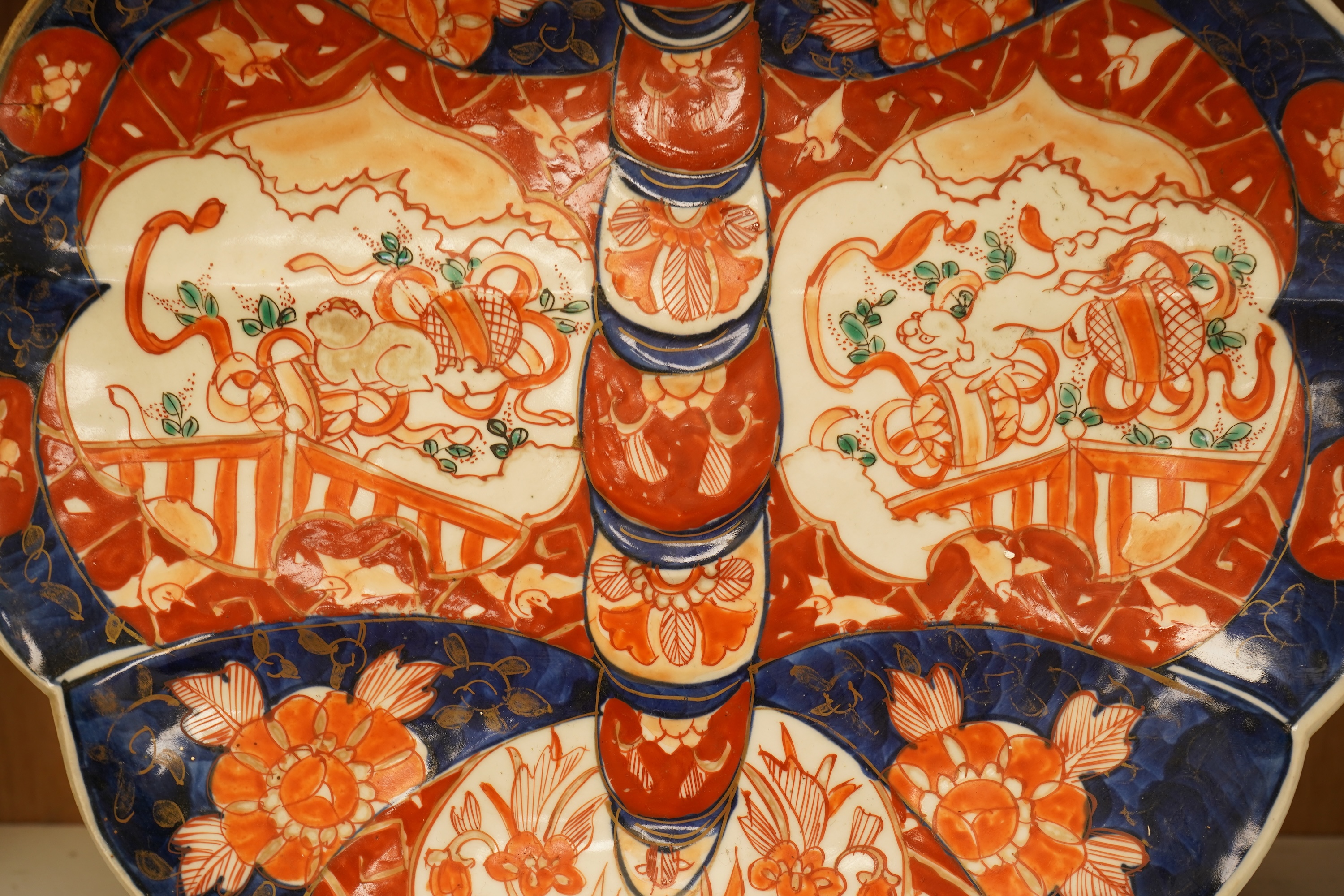 Two large Japanese Imari dishes, 19th century, to include one designed as an insect, largest 32cm wide